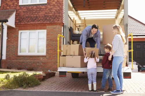 Surrey movers preparing items for a local home relocation