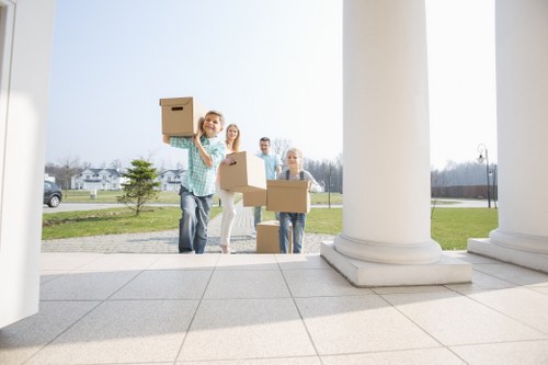 Removal team planning a house move in Surrey neighborhood