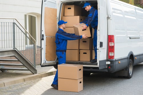 Surrey movers team handling a move with safety equipment and protective care