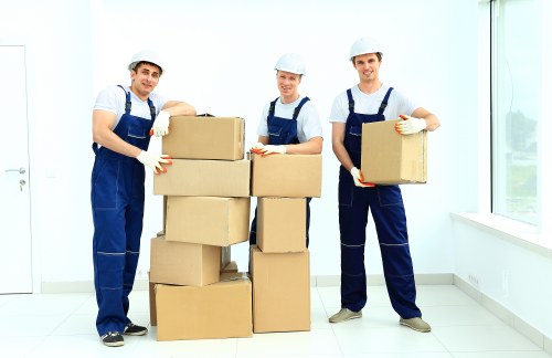 Neatly packed moving boxes ready for collection in Surrey
