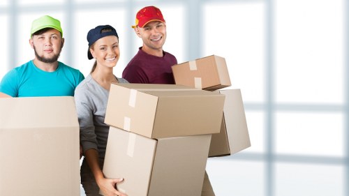 Boxes and household belongings arranged for a Surrey home move
