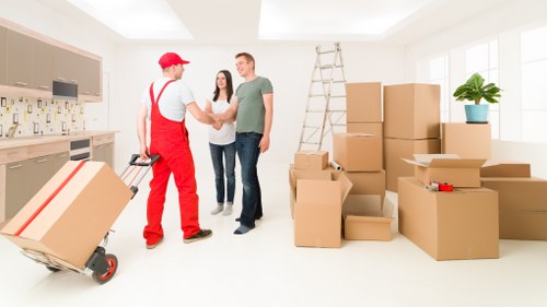 Packed boxes and furniture prepared for transport in Surrey