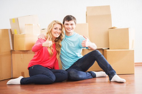 Professional movers handling access challenges at a Surrey property