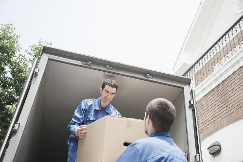 Commercial removals setup with office equipment and furniture ready for transport