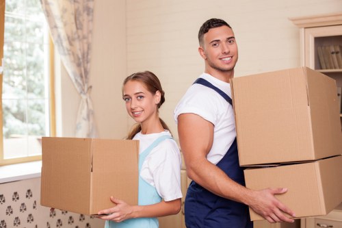 Furniture and boxes being loaded for a Surrey home or office move