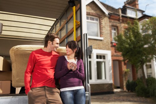 Professional movers loading household items for removals in Surrey