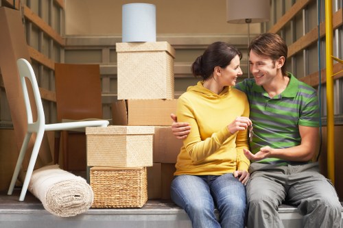 Careful loading of student belongings for transport across Surrey